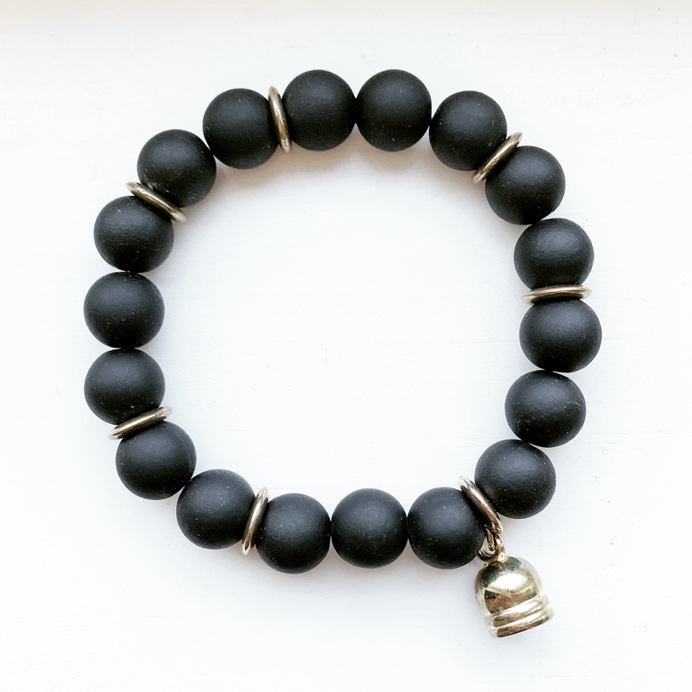 Black silicone bead & gold bell stretch bracelet